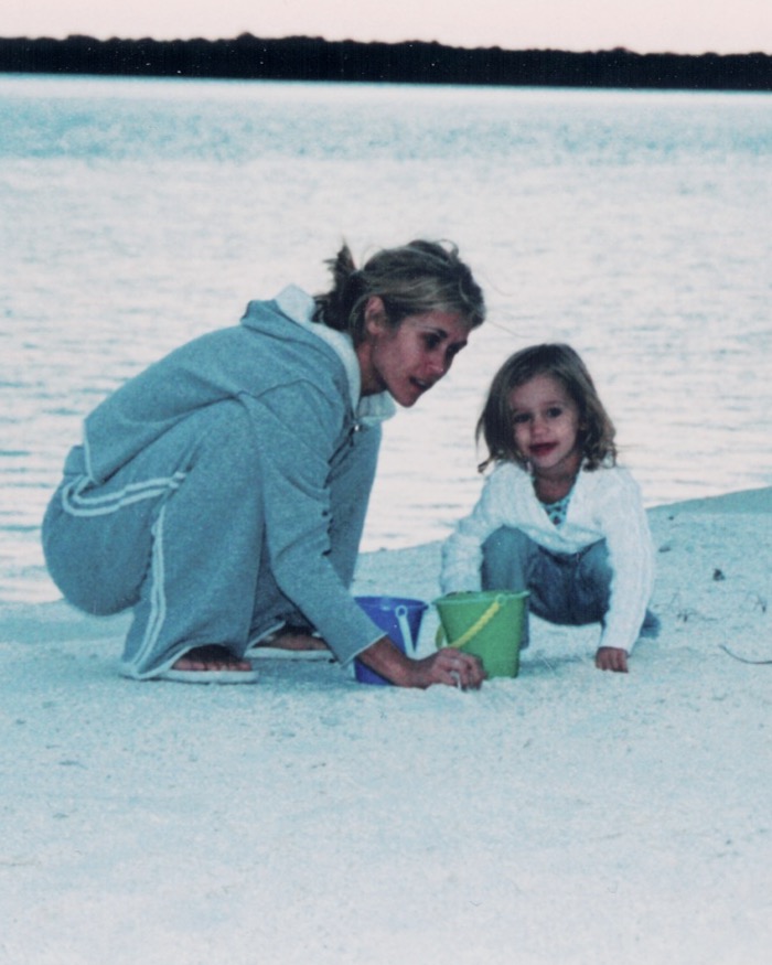 Cynthia, co-founder of incase, with her daughter on the beach